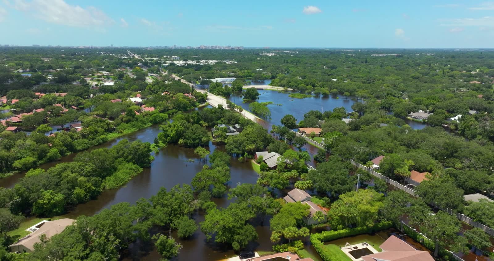 Storm surge and floodwater through a coastal neighborhood, the damage behind a denied Dunedin, FL storm surge and flood claim