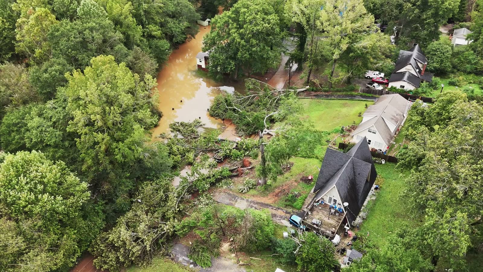 Storm surge and floodwater through a coastal neighborhood, the damage behind a denied Punta Gorda, FL storm surge and flood claim