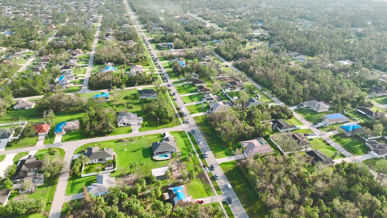 Houses in North Port, Florida with roofs torn open by hurricane wind, the losses licensed public adjusters are hired onto