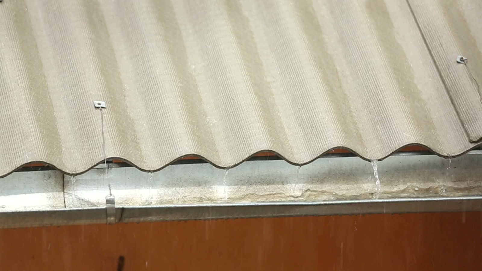Wind-driven rain forced through a roof and into the ceiling below, the damage behind a denied Naples, FL wind-driven rain claim