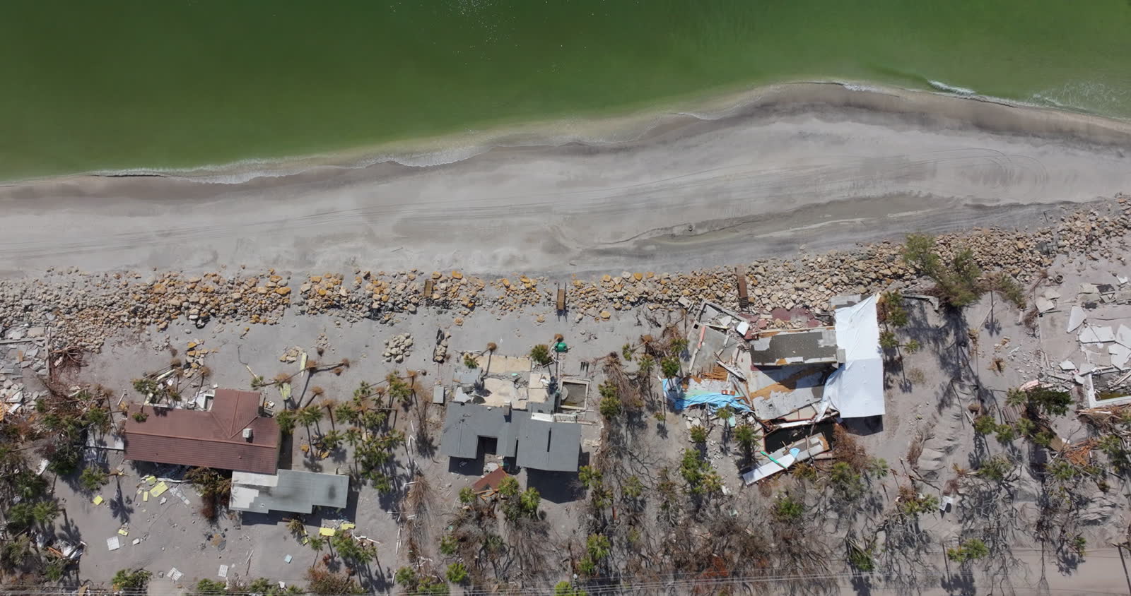 Storm surge and floodwater through a coastal neighborhood, the damage behind a denied Crestview, FL storm surge and flood claim