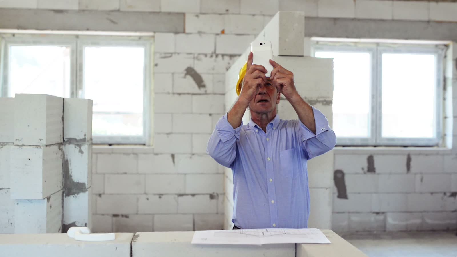 commercial-property-claim-construction-foreman-inspects-building-site.mp4
