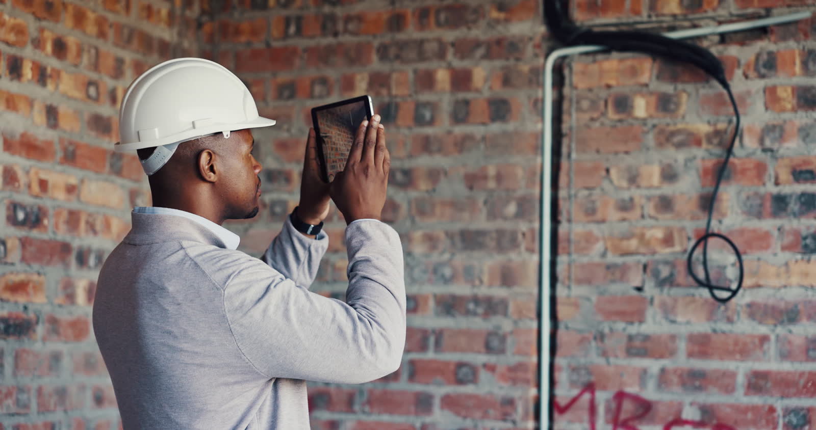 commercial-property-claim-male-architect-using-tablet-inspect-interior.mp4