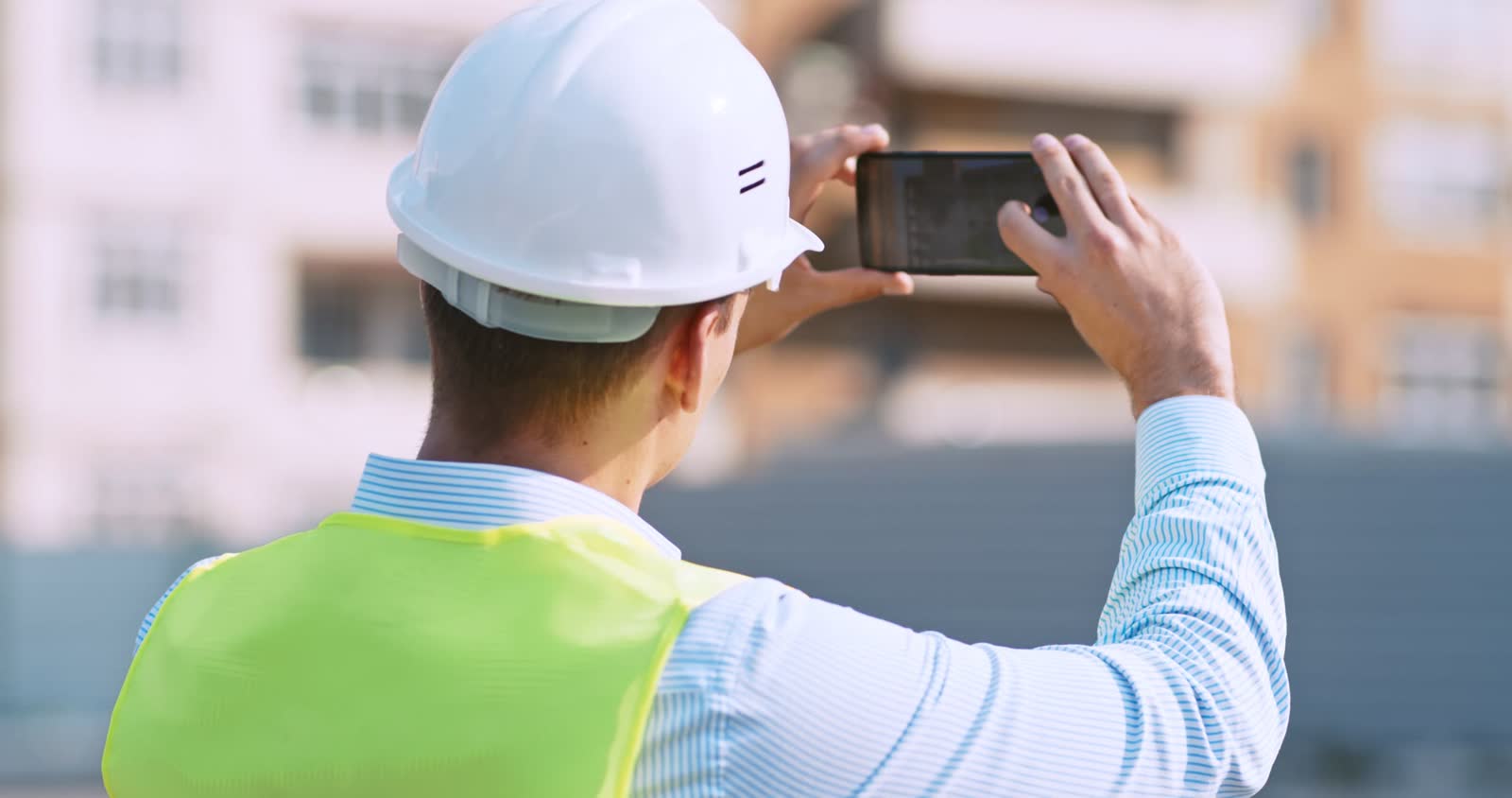 commercial-property-claim-worker-construction-site-making-photos-his.mp4
