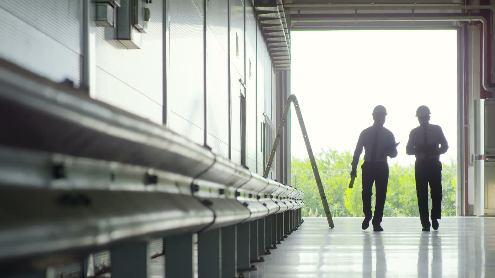 industrial-property-claim-inspectors-entering-spacious.mp4