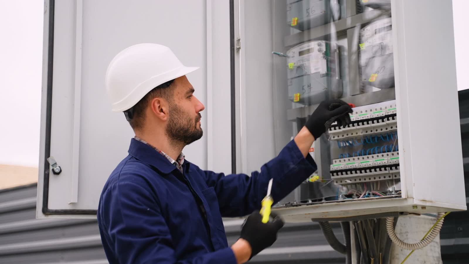 property-insurance-claim-man-inspecting-electrical-panel.mp4