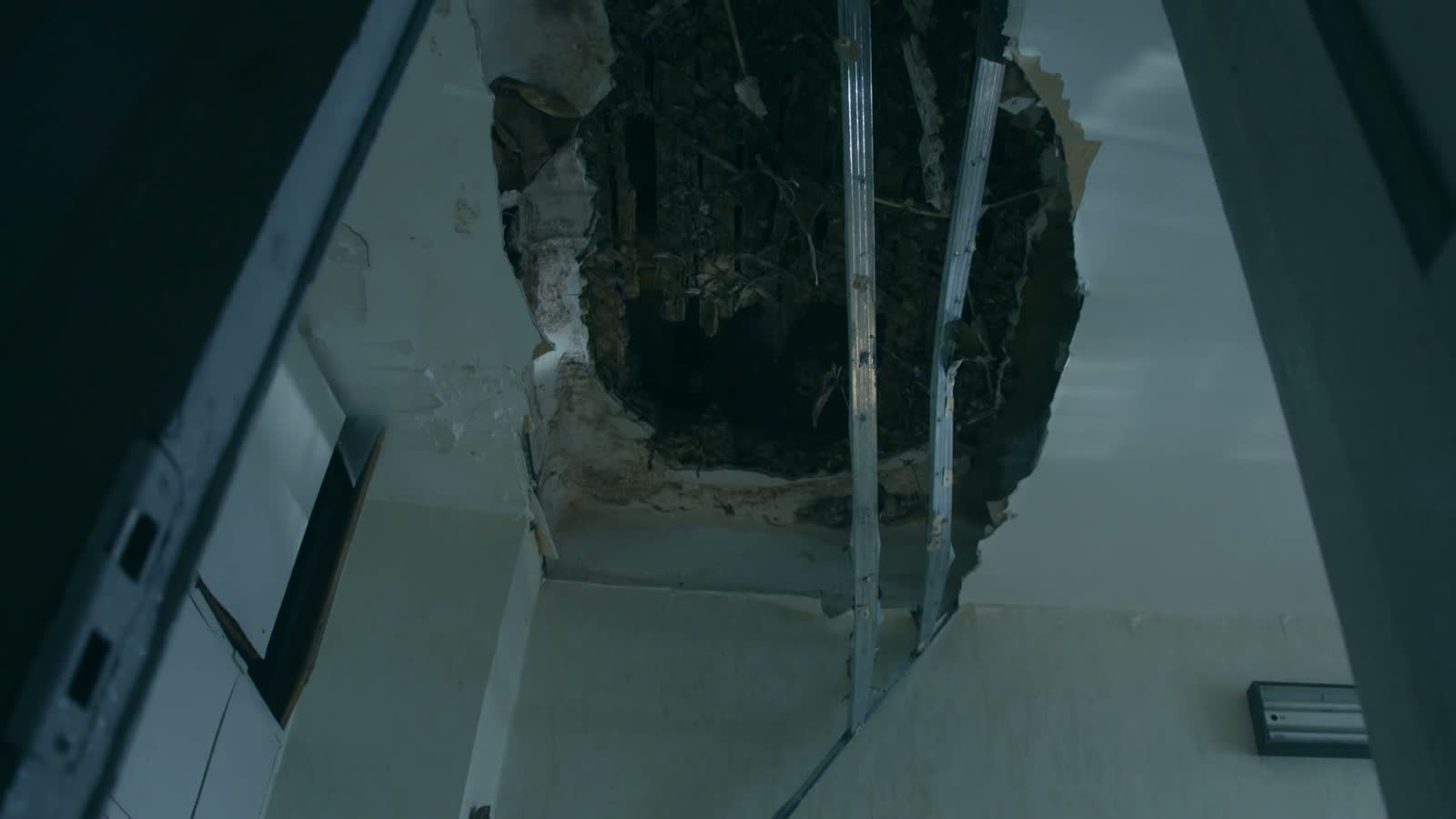 Wind-driven rain forced through a roof and into the ceiling below, the damage behind a denied Crestview, FL wind-driven rain claim