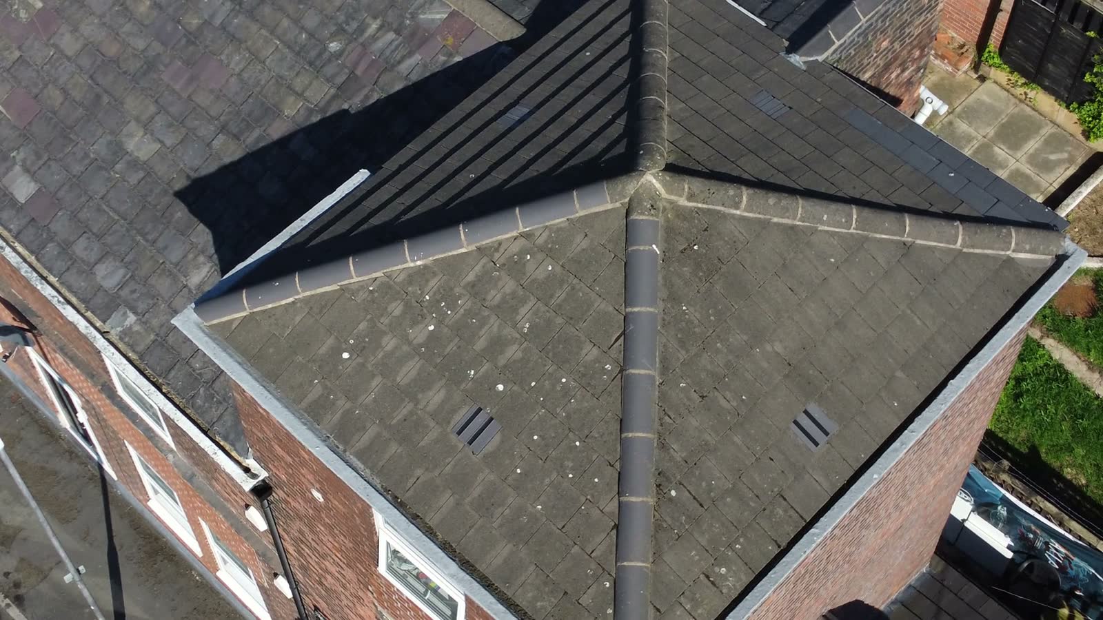 roof-damage-claim-inspection-aerial-inspecting-rooftop.mp4