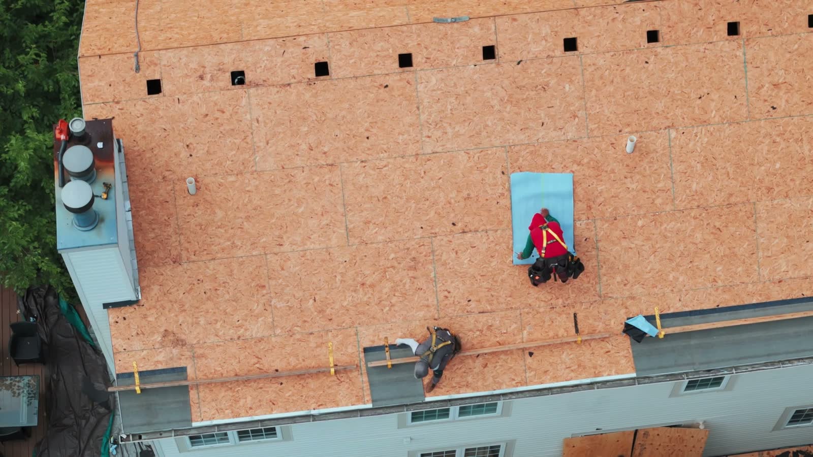 roof-damage-claim-roofers-installing-new-residential.mp4