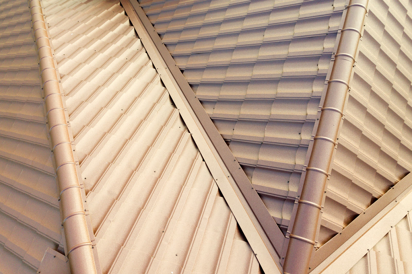 Close detail of a metal roof edge and gutter, the kind of assembly an engineer report puts an opinion on