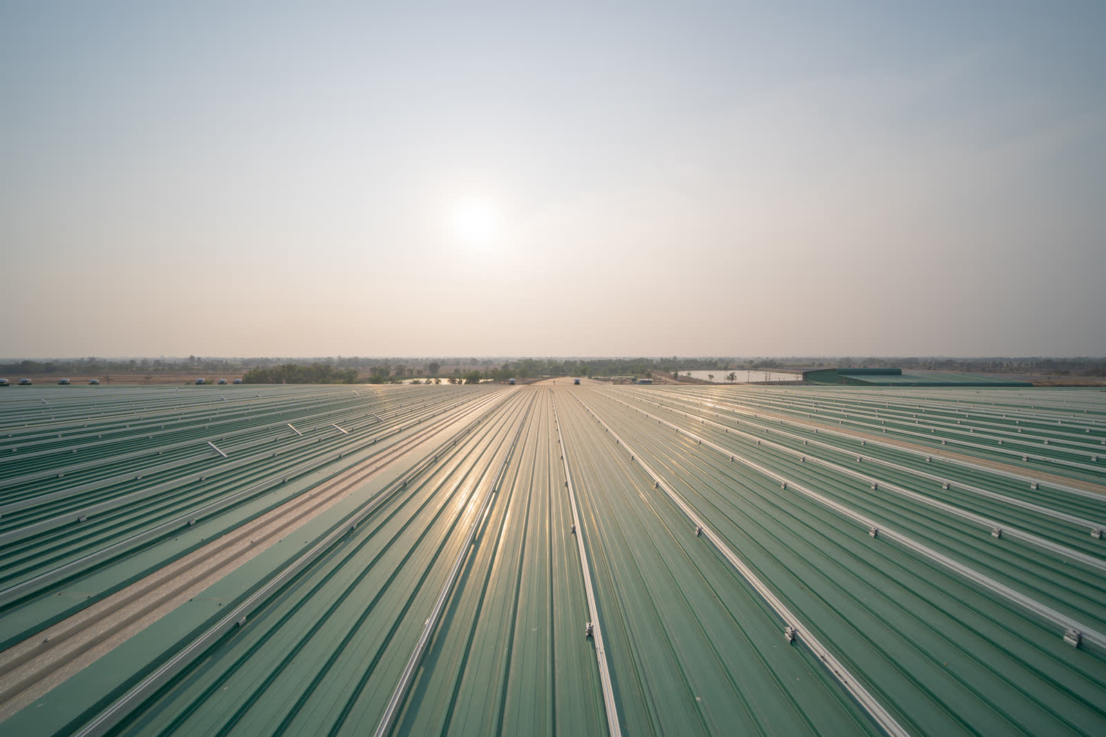 Corrugated metal roof sheeting and fasteners, the field an engineer inspects when a carrier disputes wind damage