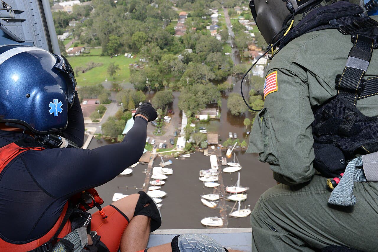 Coast Guard aircrew over a flooded Jacksonville neighborhood, September 11, the St. Johns River broke its all-time flood record