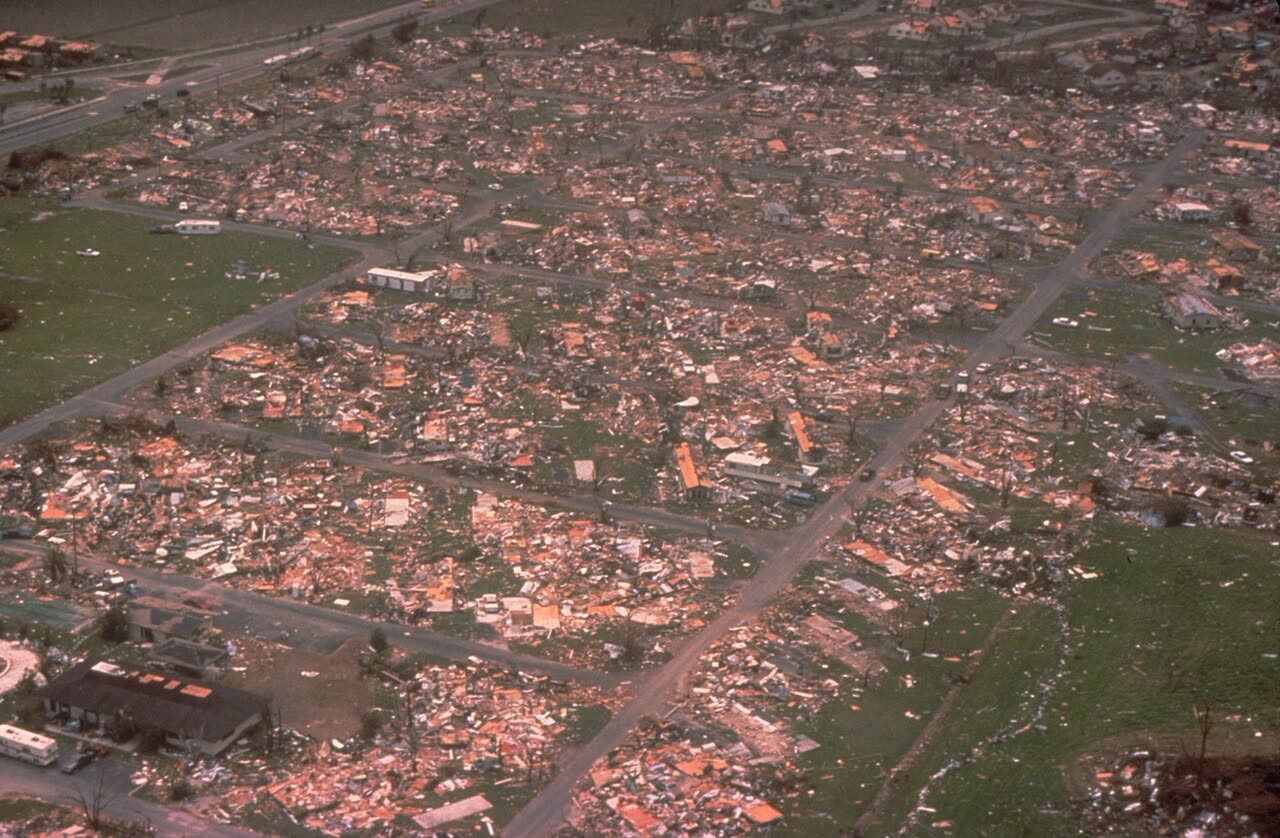 Aerial of flattened homes in southern Dade County, roughly 25,500 houses destroyed, 101,000+ damaged