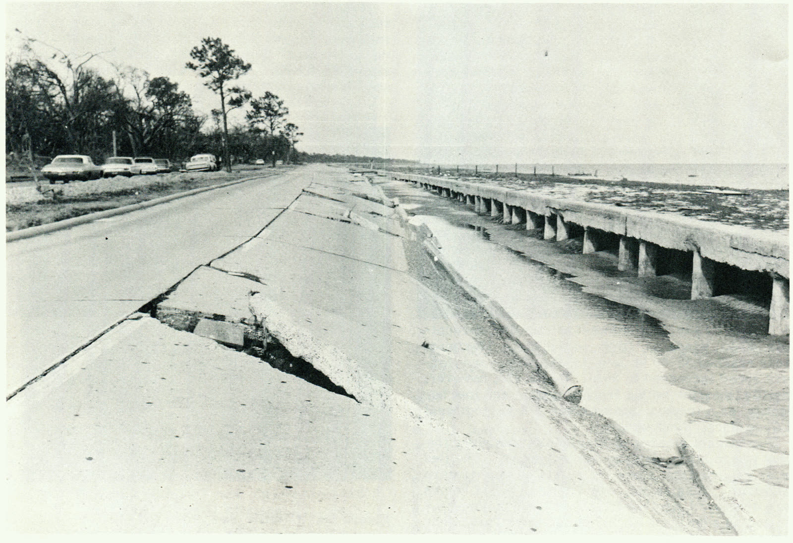 U.S. Highway 90 along the Mississippi beachfront, buckled and buried by surge
