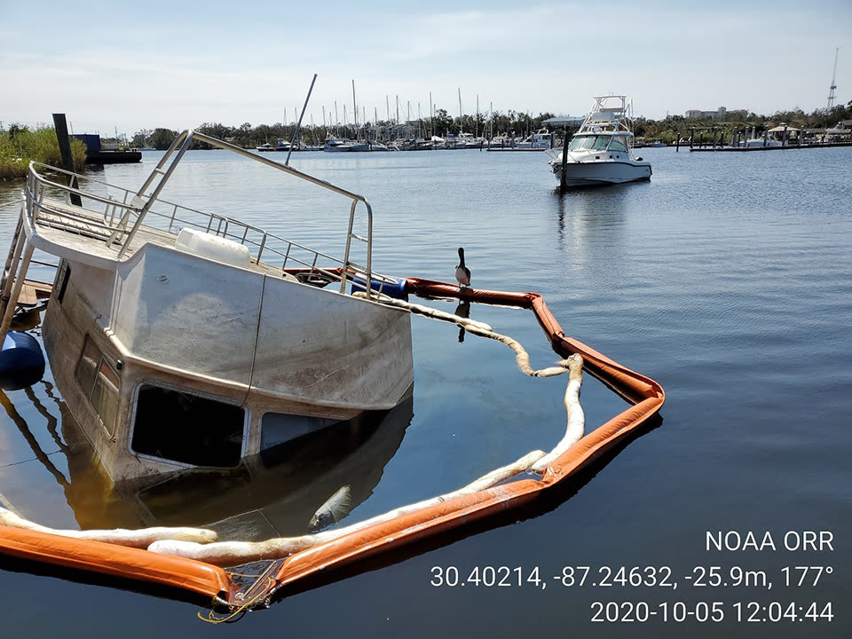 Vessel thrown ashore by Sally's surge, hundreds of boats were sunk or beached around Pensacola Bay