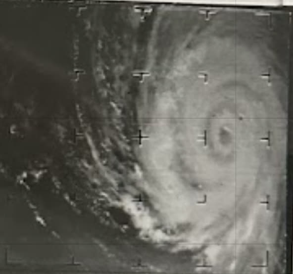 Dora near Category 4-equivalent peak intensity (130 mph, 942 mb) over the open Atlantic, September 6, 1964