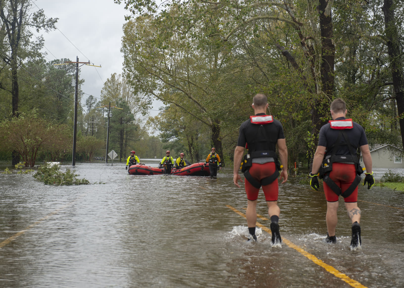 Coast Guard Jayhawk crew evacuating residents from flooded Rocky Point, NC, September 16, 2018