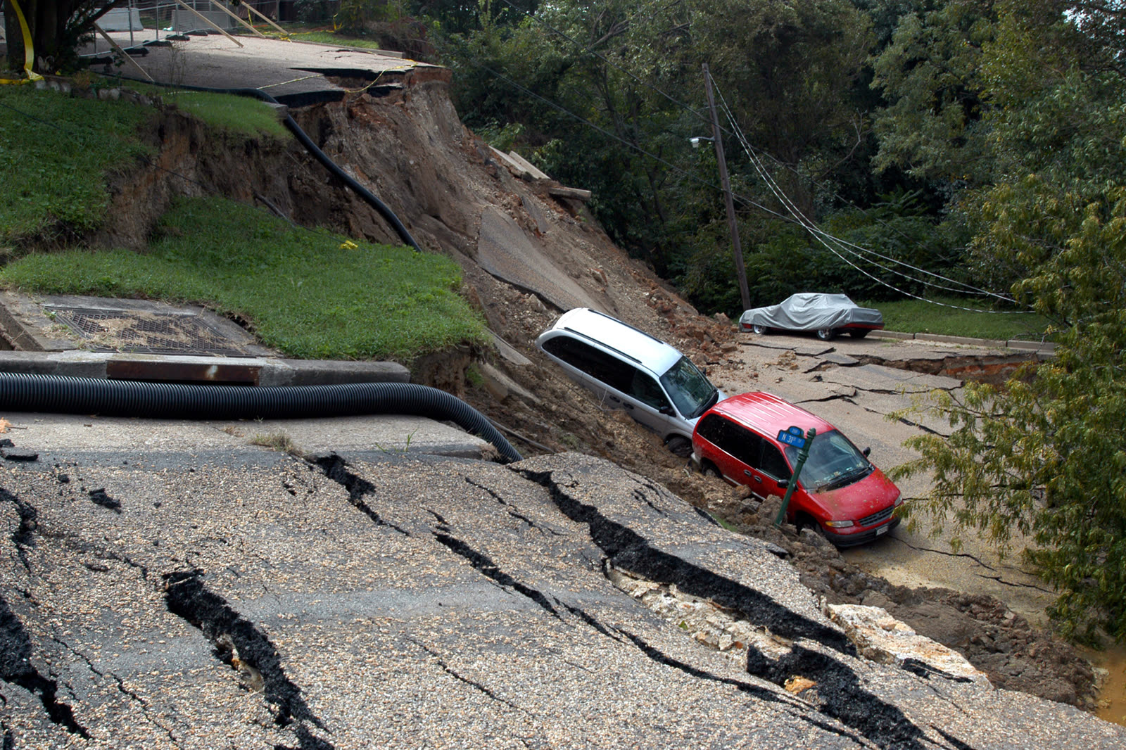Washout on E. Grace Street, Richmond, Gaston's runoff carved through streets as well as buildings