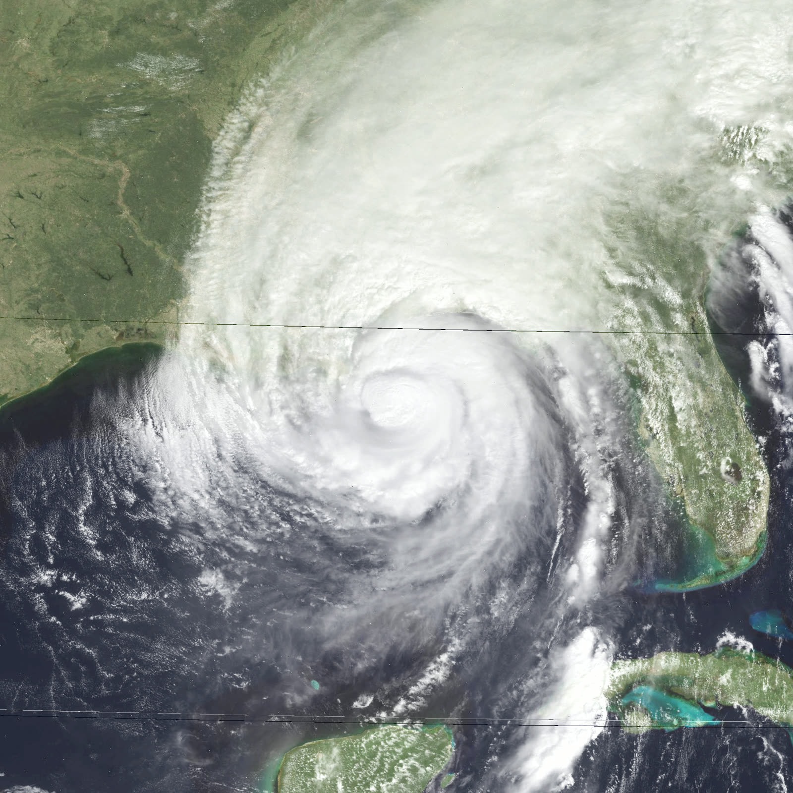 Opal near landfall as a weakening Category 3, late afternoon October 4 - the surge it built at Category 4 strength arrived anyway