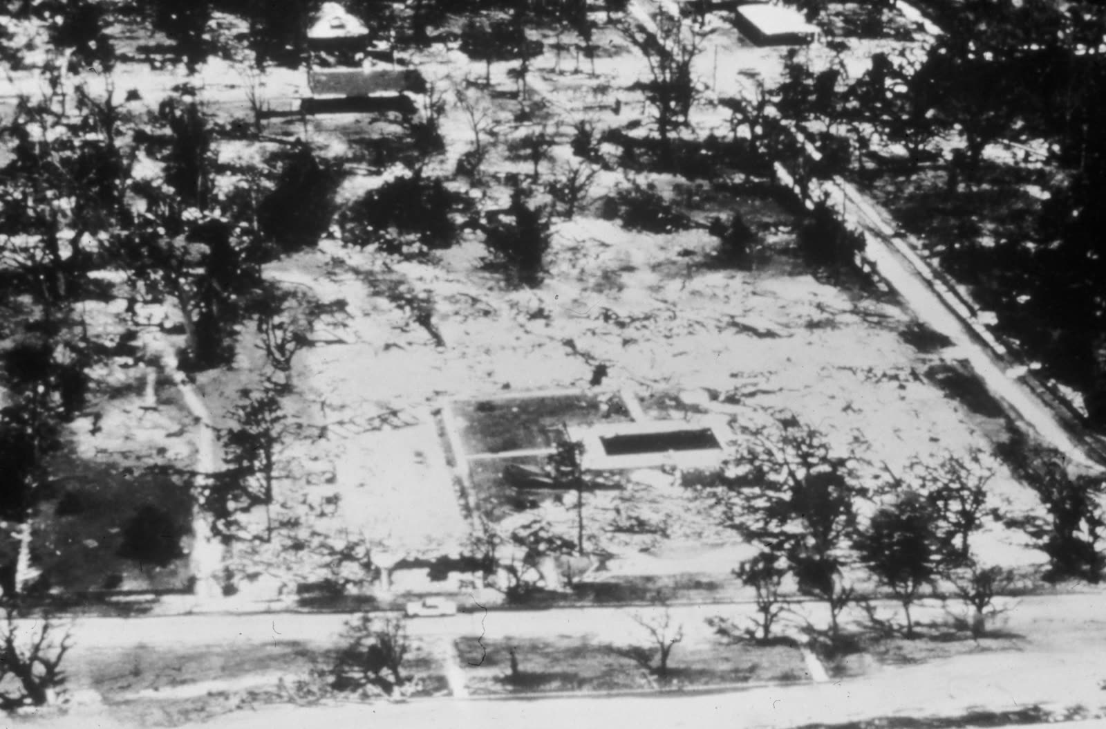 The Richelieu Apartments after the 24.6-ft surge, slab-clean destruction that framed the wind-vs-water fight