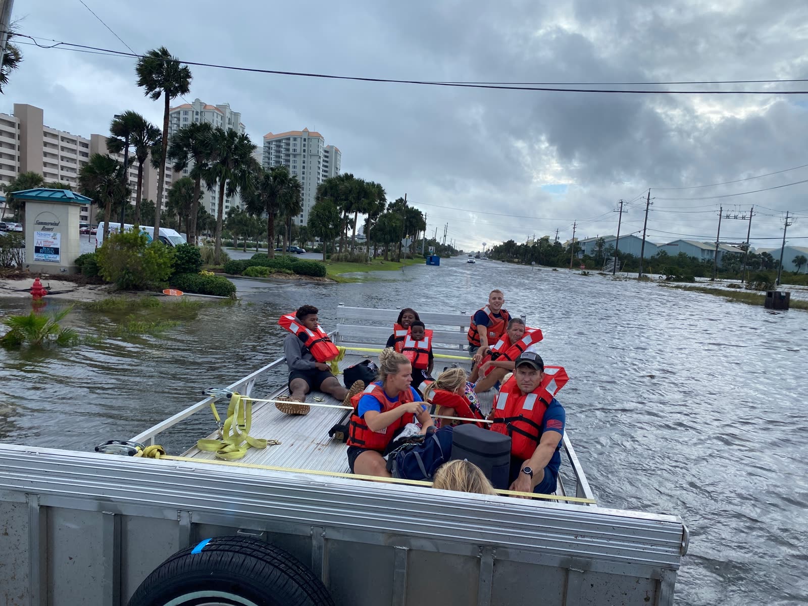 Coast Guard shallow-water team rescuing residents from floodwater near Navarre Beach, FL, September 16