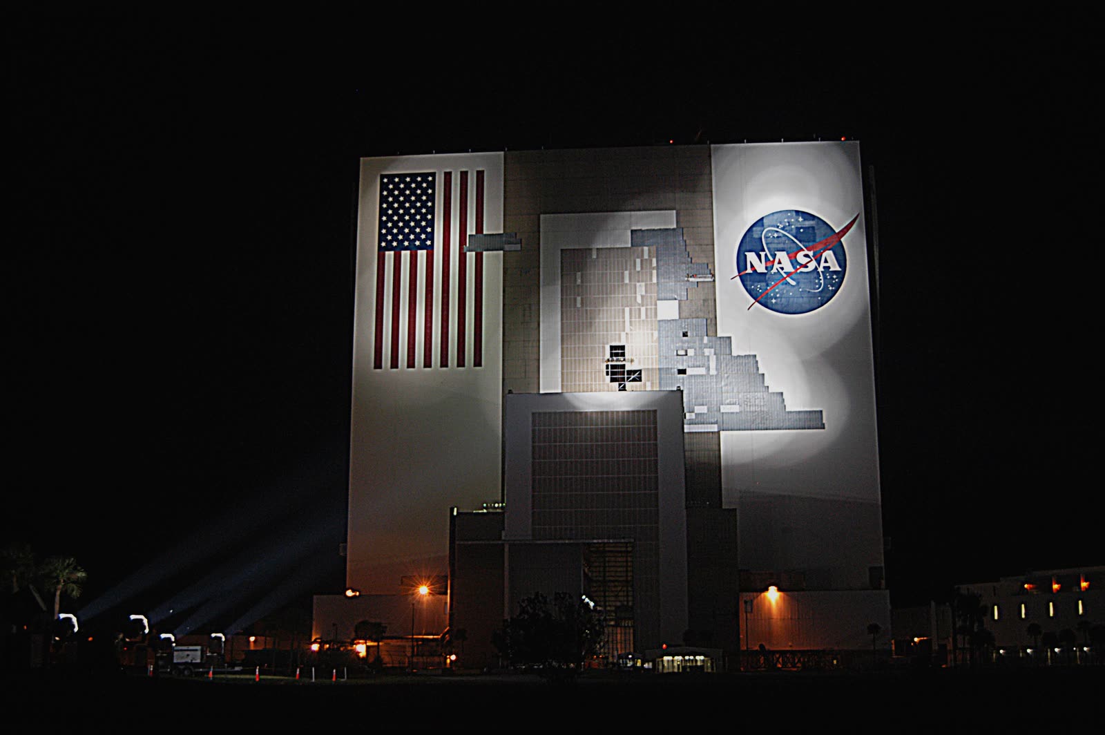 Kennedy Space Center's Vehicle Assembly Building stripped of exterior panels, the space center reported over $100 million in damage